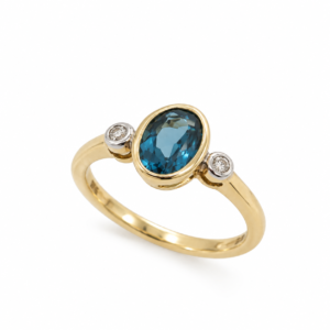 9CT YELLOW GOLD LONDON BLUE TOPAZ & DIAMOND TRILOGY RING