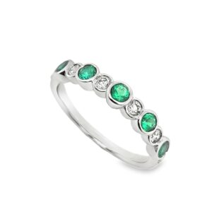 18CT WHITE GOLD EMERALD & DIAMOND HALF ETERNITY RING